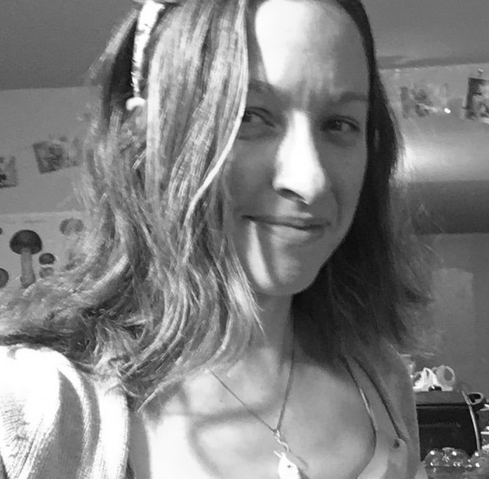 Image of Loretta Pedersen, smiling, sans glasses.